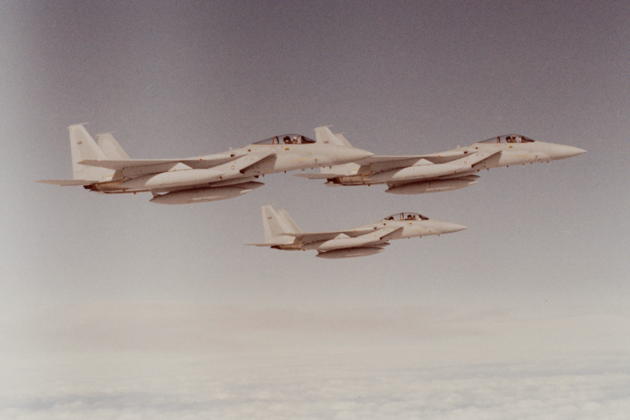 Flying F-15C 80-100, leading a 3-ship of 'unmarked' Eagles across the North Atlantic for delivery to the Saudi AF at Taif, Saudi Arabia on 4 March 1983. Later Saudi registration of 80-100 was 609, then re-serialed to 1313. 1313 crashed into the desert on 1 Nov 2006, with pilot Captain Abdullah Abuthnain ejecting safely. Photo by the KC-135 tanker crew.
