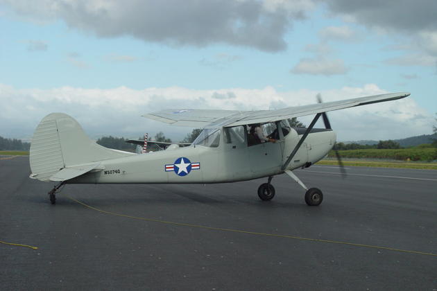 Elmer Udd's L-19 Bird Dog towplane at Dillingham airport, on the north shore of Oahu.