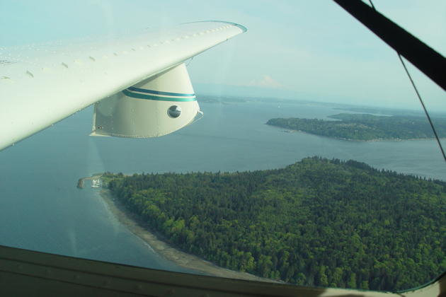 Cruising over Blake Island, west of Seattle over the Puget Sound.