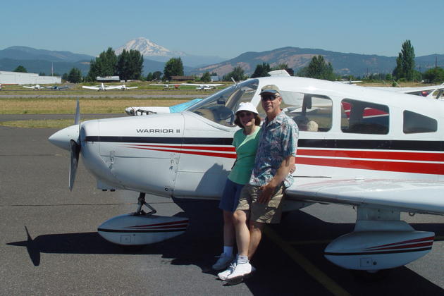 Ma and me at the Hood River, OR airport with our Warrior II, with Mt. Adams in the distance. Photo by Jim Lambo.