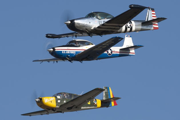 Four-ship flyby at Paine Field of the Navions, IAR-823 and Nanchang CJ-6. Photo by John Clark.