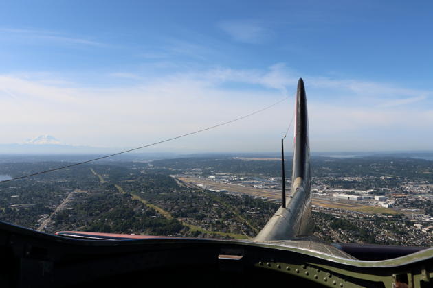 A sweeping view from the B-17 mid-fuselage after takeoff from Boeing Field, with Mt Rainier in the distance.