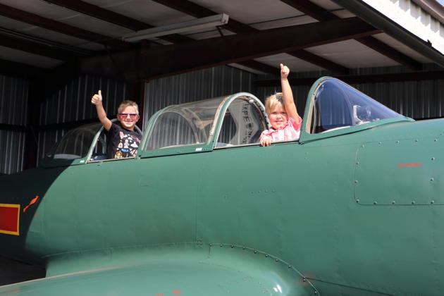 Alex and Nathaniel ready for checkout in the Nanchang CJ-6. OK, Ma, I'll wait until they get a bit older.