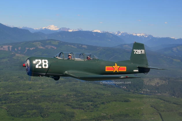 Cruising in formation in Justin Drafts Nanchang CJ-6 (N280NC), with Dean 'Frito' Friedt in my backseat. Photo by Karyn King.