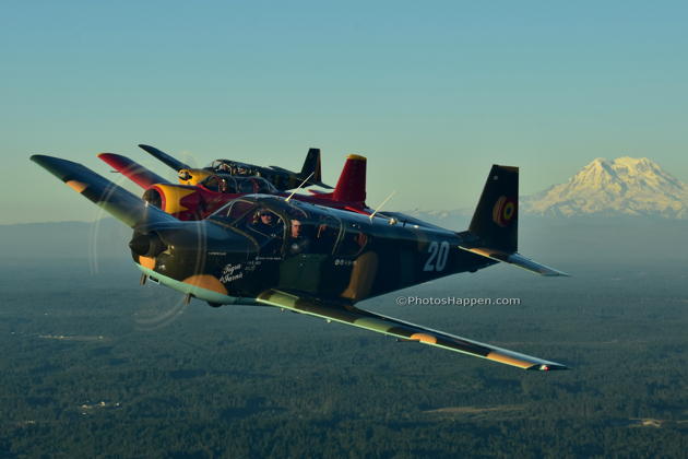 Vic Norris in his IAR-823, with Tom Elliott in his Nanchang CJ-6 and Bob Hill in his IAR-823, catching the afternoon rays in front of Mt. Rainier. Photo by Karyn 'SkyQueen' King.