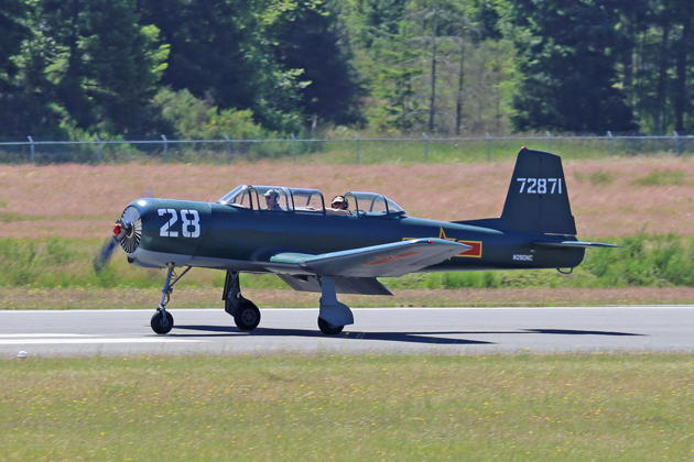 Taxiing in with 'Tall Tom' Burlace in my pit after a Nanchang formation flight at Bremerton. Photo by Dan Shoemaker.
