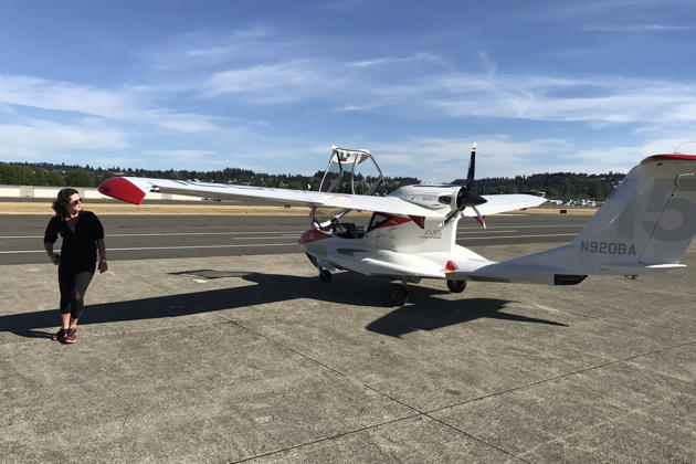 Macaela Wright pre-flighting the Icon A5 at Renton before our local orientation flight.