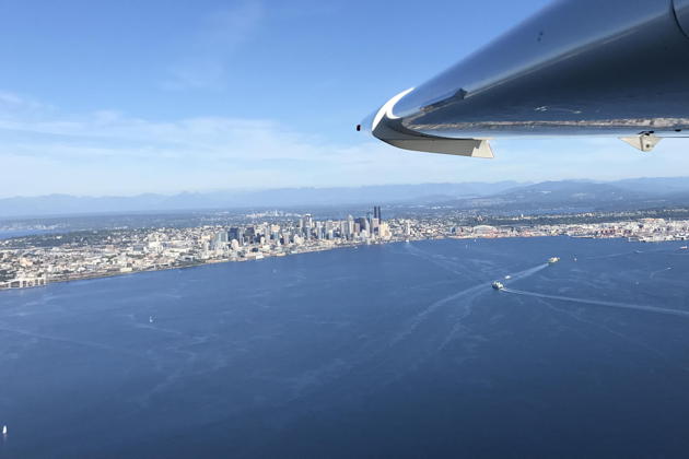 Elliott Bay and downtown Seattle from the open side window of the Icon A5.