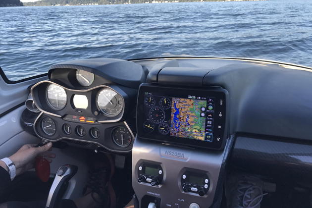 A view of the Icon A5 cockpit on the waters of Lake Sammamish.