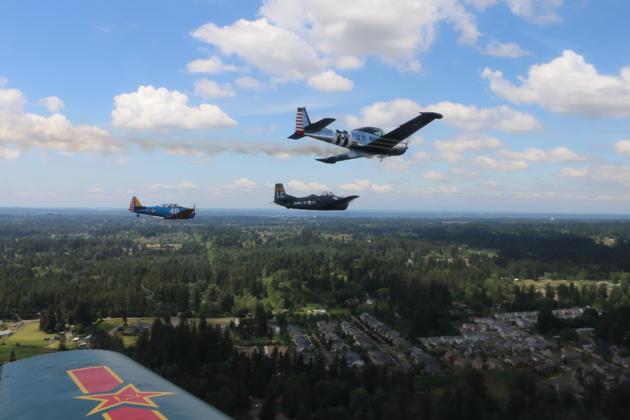 Dave Desmon pulling up for the Missing Man over the Tahoma National Cemetery. Photo by Walt Cannon.