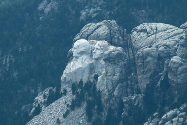 Mt. Rushmore coming into view as we fly by, with George Washington, Thomas Jefferson and Abe Lincoln's nose in view.
