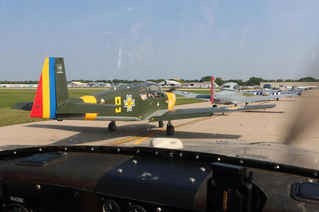 Lining up for a 7-ship departure from Oshkosh runway 27.
