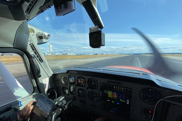 Chris Marshall touching down on runway 16L at SeaTac in his Cessna 150.
