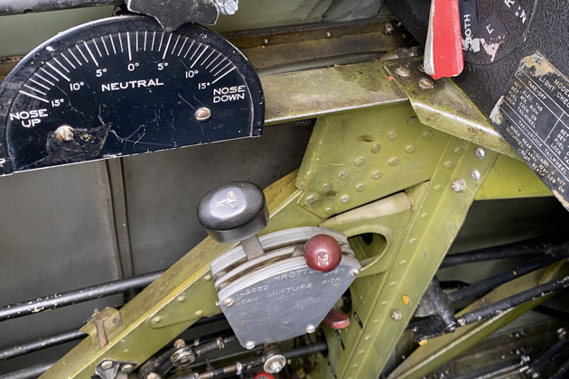 Throttle, mixture and trim controls in the front cockpit of the N3N.