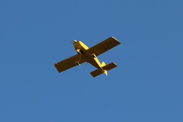 Dave Miller climbing out from Renton in his RV-14A.