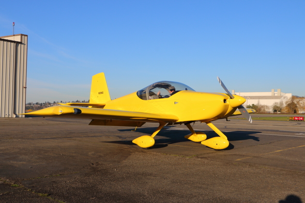 Dave Miller ready to start his RV-14A at Renton. Notice the impressive headroom available.