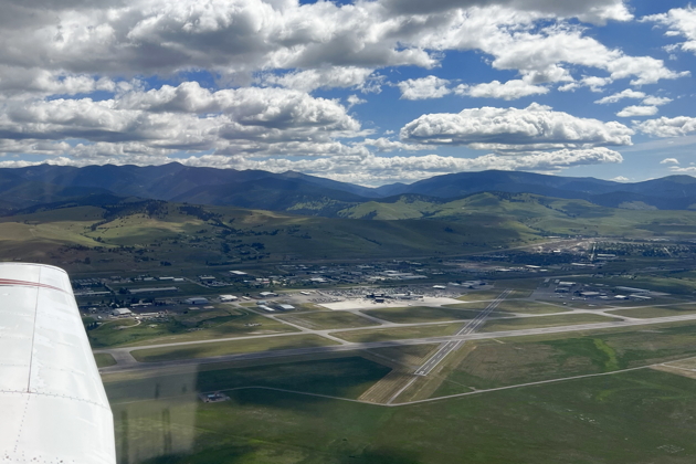 Entering downwind for a refueling stop at Missoula, MT (KMSO).