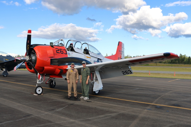 Post-flight  with Scott Urban after two awesome four-ship flights in his T-28. Photo by Brodie Winkler.