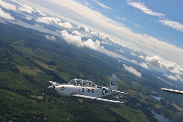 Jim Ostrich's T-34 over the green Northwest, with Mt. Rainier in the distance.