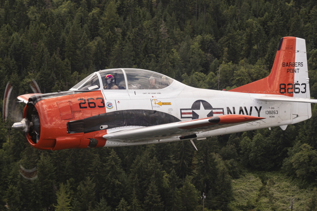 Low altitude climb out on the wing in Scott Urban's T-28. Photo by Brodie Winkler.