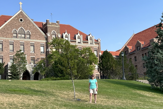 Ma back after 46 years at her alma mater of Carroll College in Helena, MT.