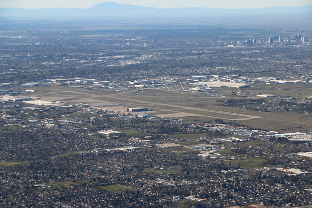 McClellan, CA (KMCC) airfield with Sacramento in the distance.
