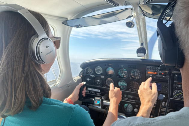 Katie at the controls of 3DC as pilot-in-command near Long Beach. Photo by David Kasprzyk.