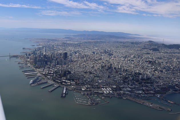 A gorgeous view of San Francisco from over the bay in 90 degree heat dome air at 2500', with cooling ocean clouds along the coast. Photo by Theresa Seitel.