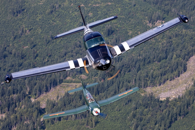 Chasing the Navion in the Nanchang, great prop blur. Photo by the Skyvan Aviation PhotoCrew.