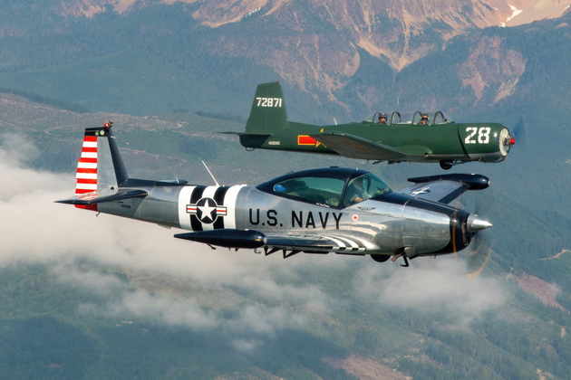 Close formation by the base of the Twin Sisters. Photo by the Skyvan Aviation PhotoCrew.