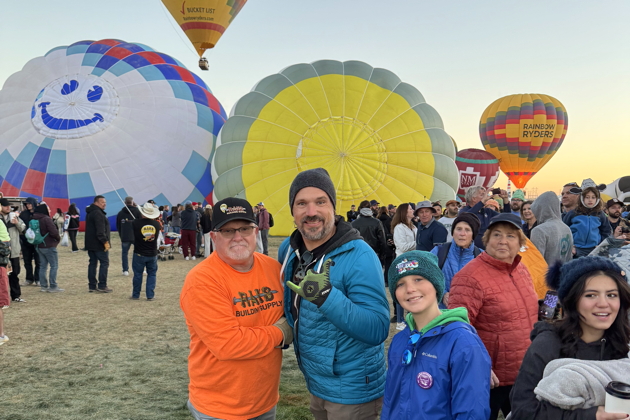 D and Nathaniel crewing on the crown for the RAKS balloon at Balloon Fiesta Park. My photo.