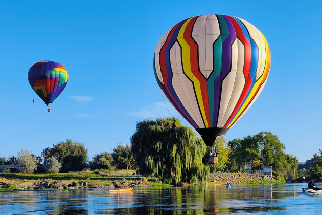 Mandy Johnson flies 'Ohana Maka' over the Yakima River in Prosser. Photo by Vicky Tabisola Olson.