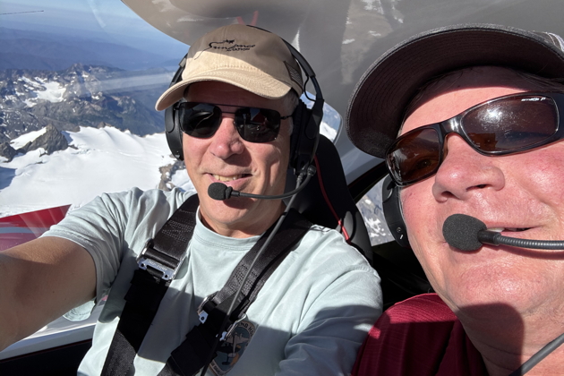 With Devin Dufenhorst and his Bristell 915 over Mt. Olympus. My photo.