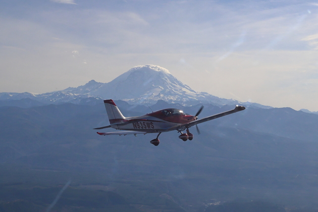 Leading the formation in Brian Malcolm's Sling TSi in front of Mt. Rainier. Photo by Steve Cameron.