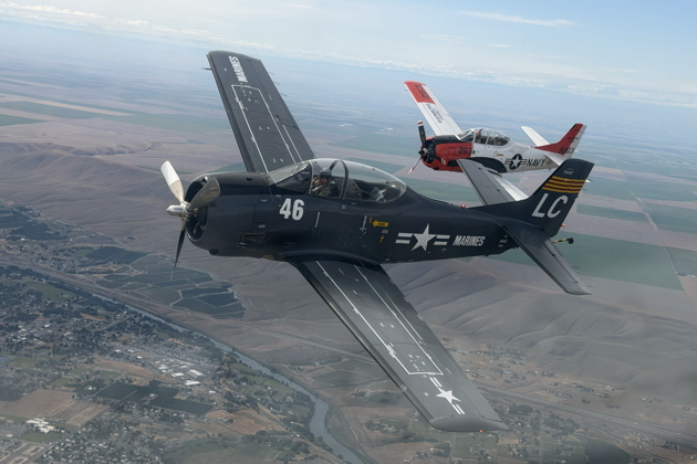 Roger Collins in T-28B N28LC with Scott Urban's T-28B N63NA. My photo.